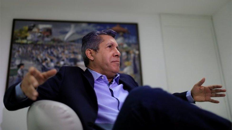 Venezuelan presidential candidate Henri Falcon gestures as he speaks during an interview with Reuters in Caracas, Venezuela February 28, 201