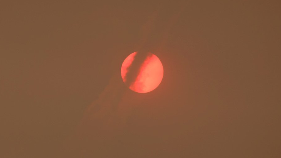 Parts of the Wales saw a red sunrise on Monday morning because Ophelia has dragged a lot of Saharan dust with it