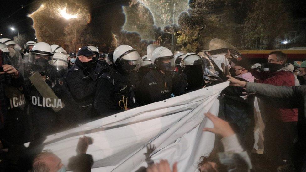 People block a street near the house of Law and Justice leader Jaroslaw Kaczynski during a protest in Warsaw, Poland October 23, 2020.