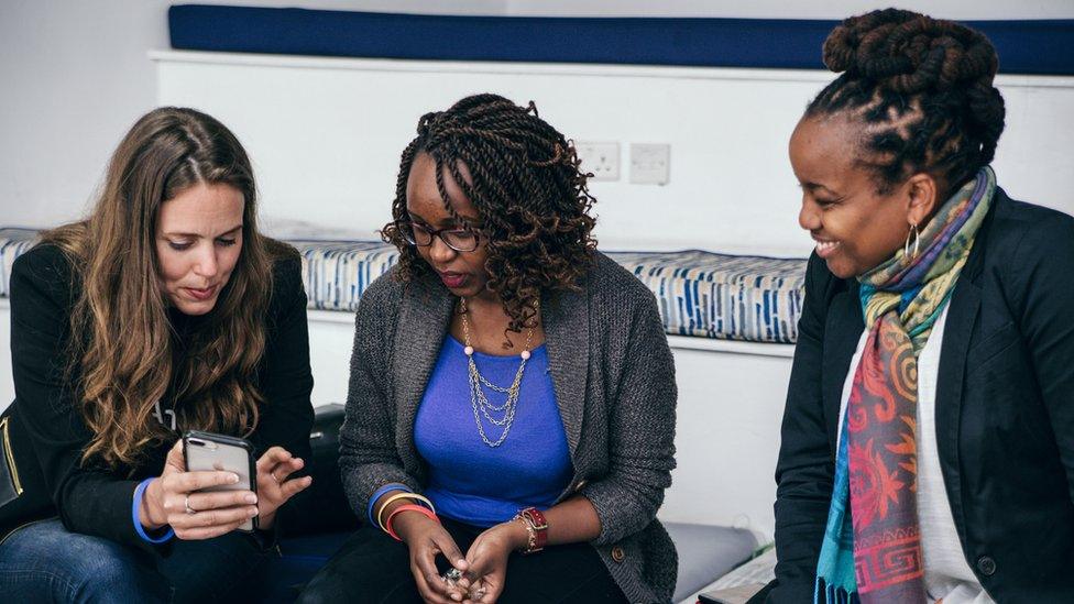 Christina Sass (left) with Andela employees