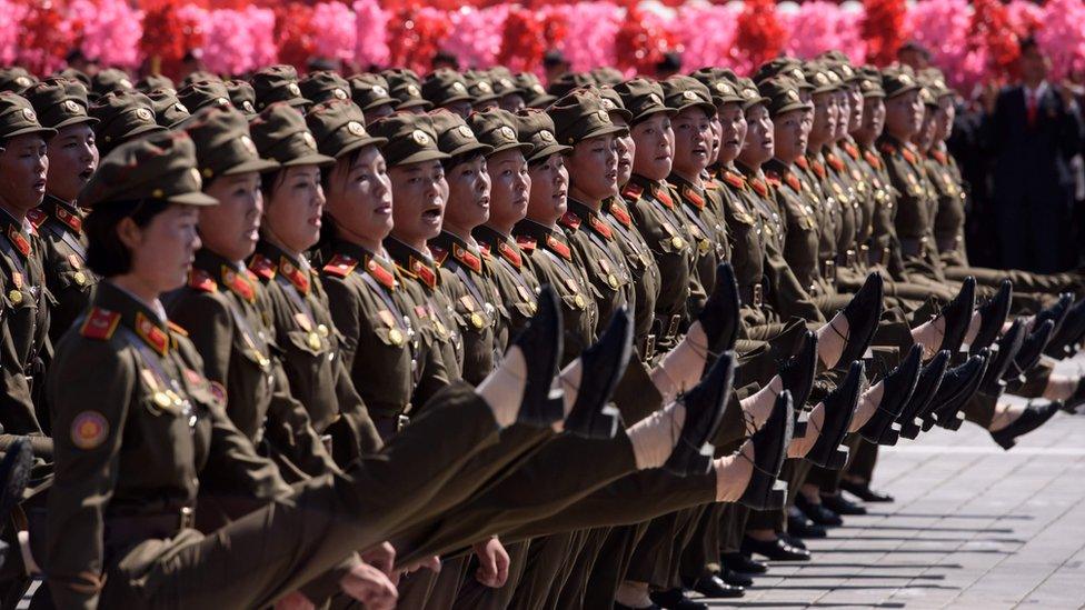 Korean People's Army (KPA) soldiers march during a mass rally