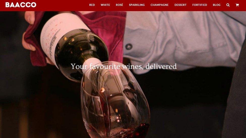 Screengrab from Baacco homepage: wine being poured into glass