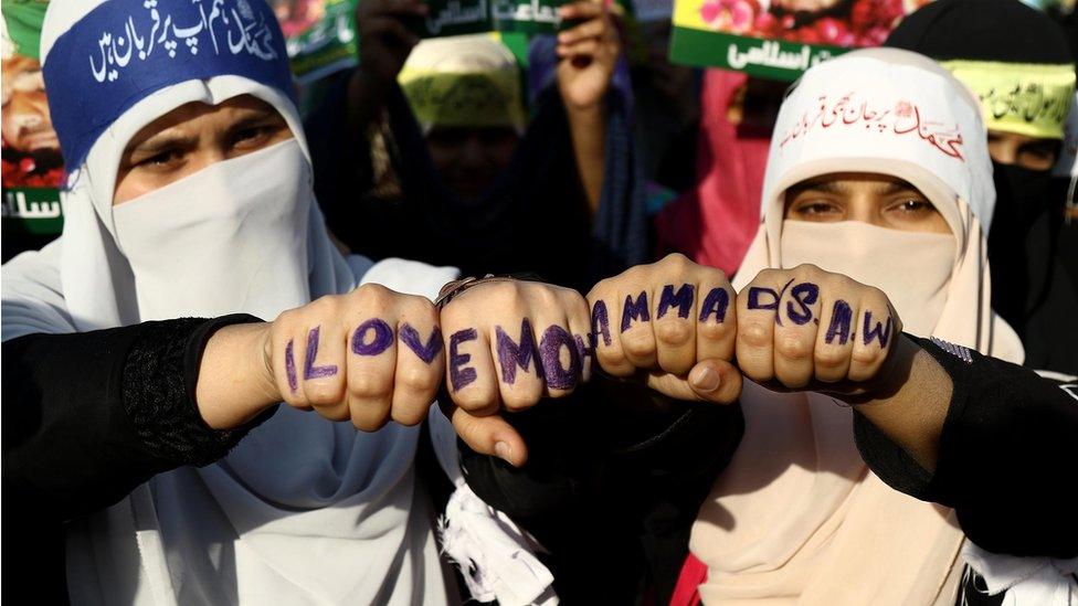 Female supporters of the Islamic political party Jamat-e-Islami wearing head bands reading in Urdu "For Muhammad (praise be upon him) we lay down our lives" during the protest