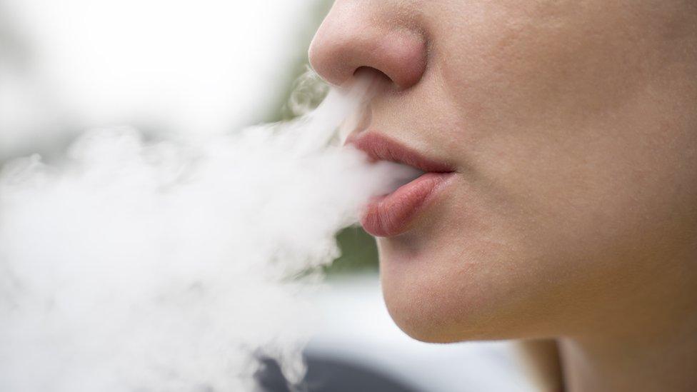 Close-up of a person vaping