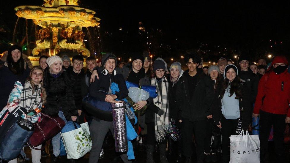 Young people gather before sleeping out in Trafalgar Square