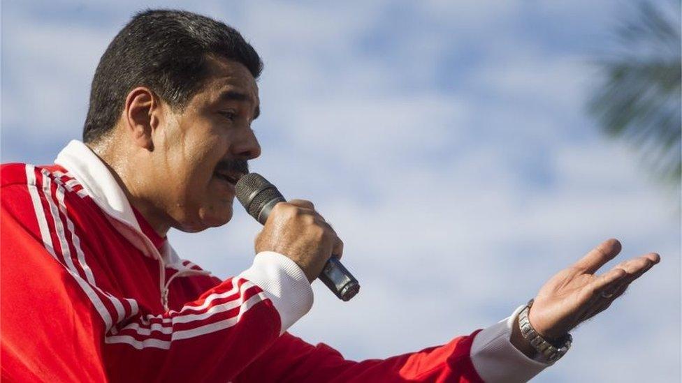 Venezuelan President Nicolas Maduro speaks to supporters near to the presidential palace in Caracas, Venezuela, on 15 December 2015