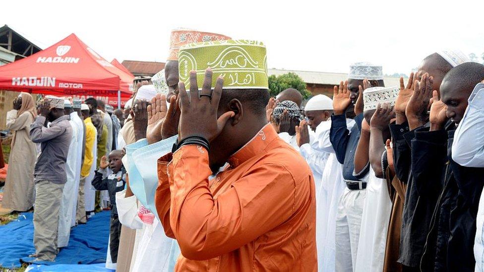 Muslims arrive to perform the Eid Al-Adha (Feast of Sacrifice) prayer at Mobanda Mosque in Beni, Democratic Republic of the Congo on September 12, 2016.