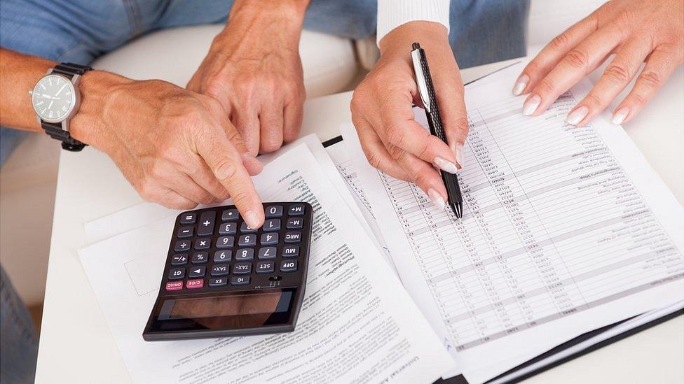 Couple looking at finances