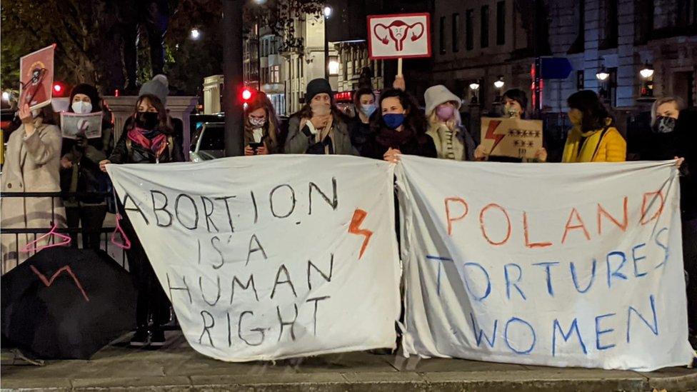 Protesters outside the Polish embassy in London