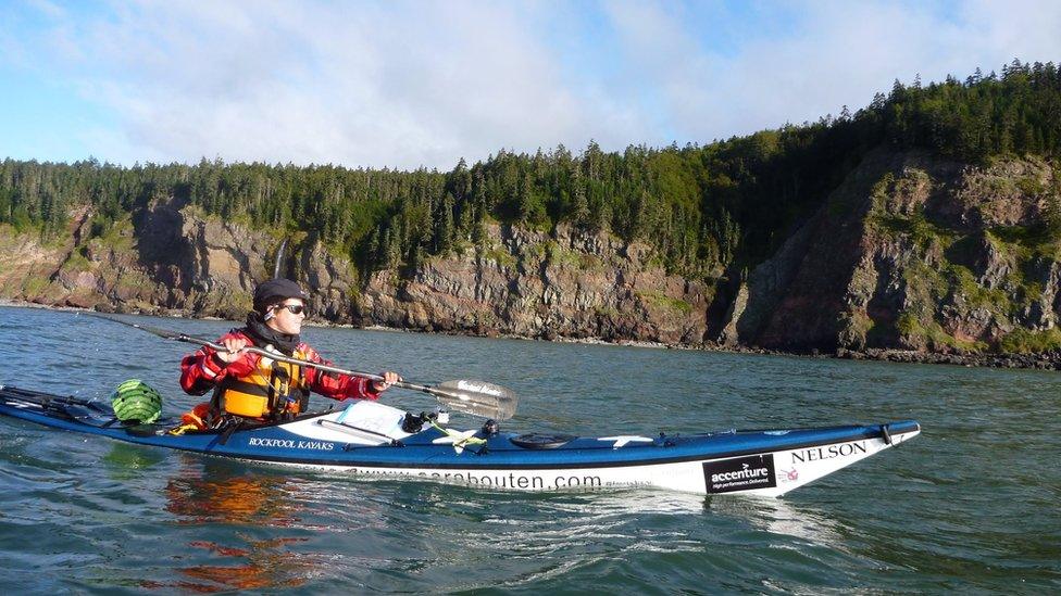 Sarah and her kayak in Russia