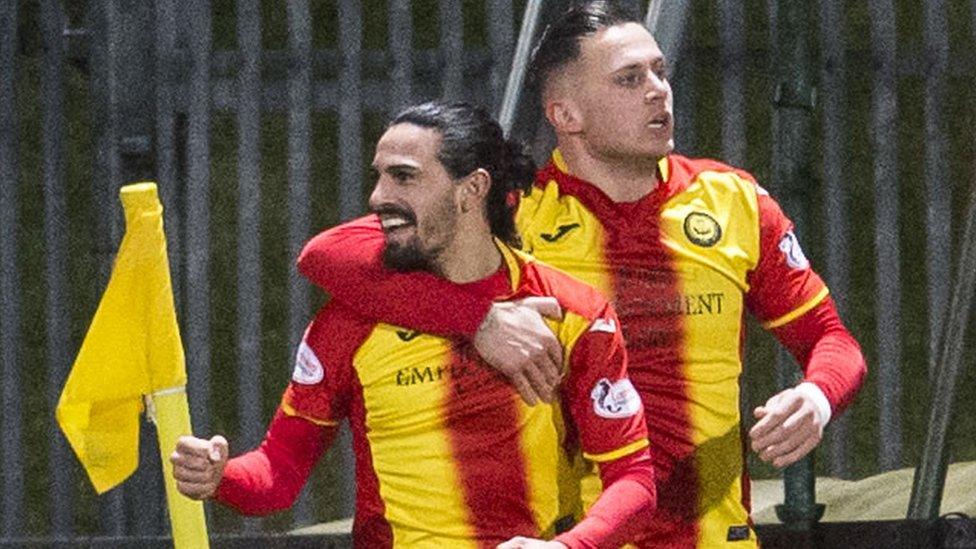 Ryan Edwards (left) celebrates scoring Partick Thistle's second goal with Miles Storey