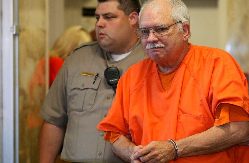 Robert Bates, a former Oklahoma volunteer sheriff's deputy, is escorted from the courtroom following his sentencing in Tulsa, Oklahoma, on 31 May