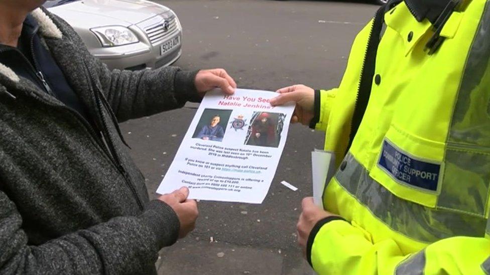 Police handing out leaflets