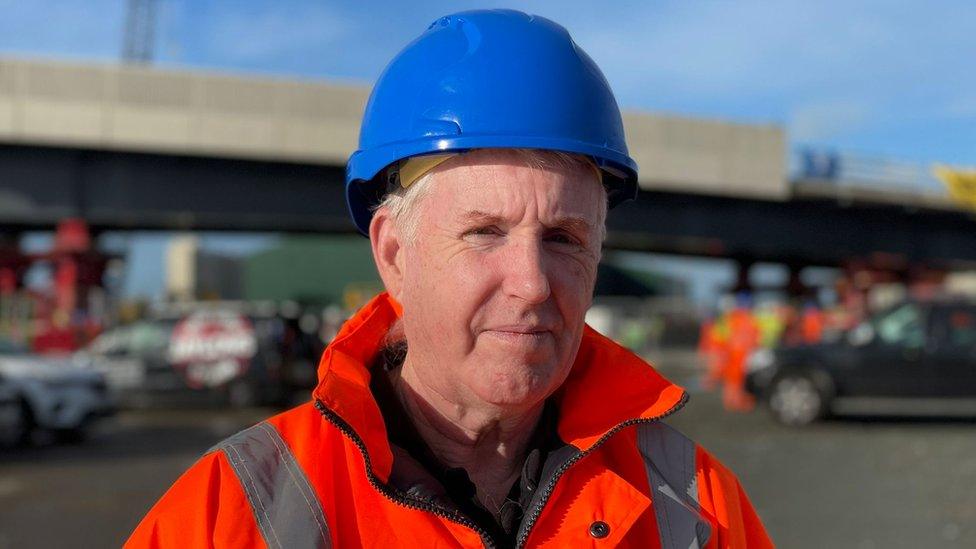 Simon Bretherton, project director for Suffolk County Council standing infront of the bridge section