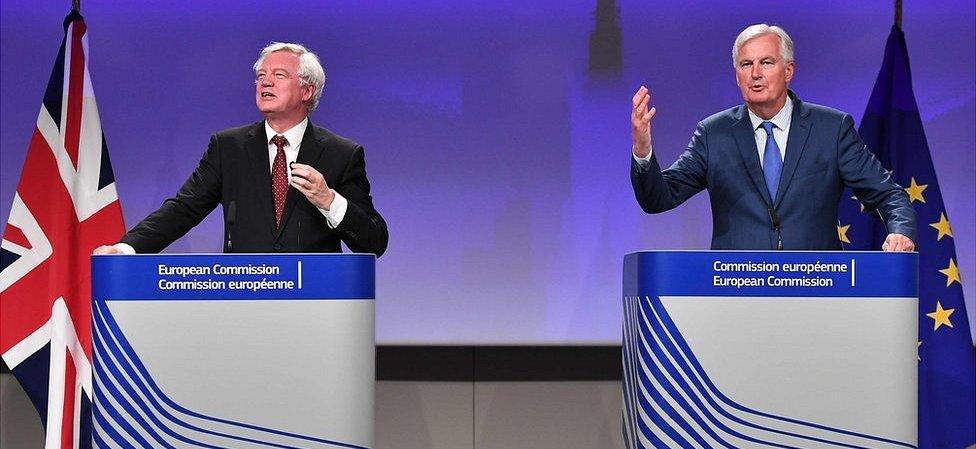 Brexit negotiators David Davis (L) and Michel Barnier