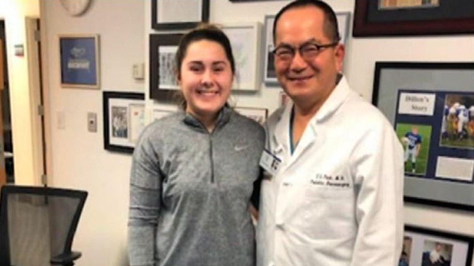 Maddi Thurgood with a doctor