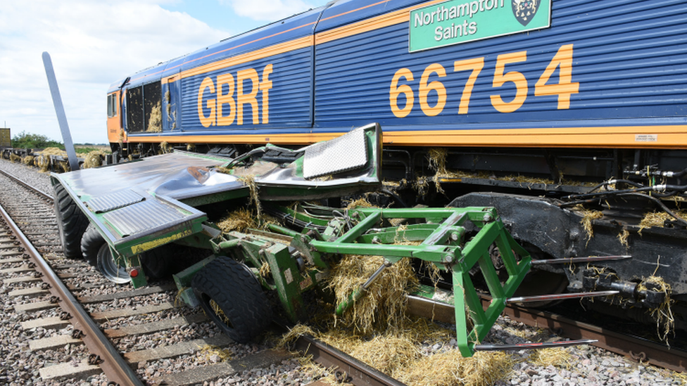 Train and bale chaser after crash