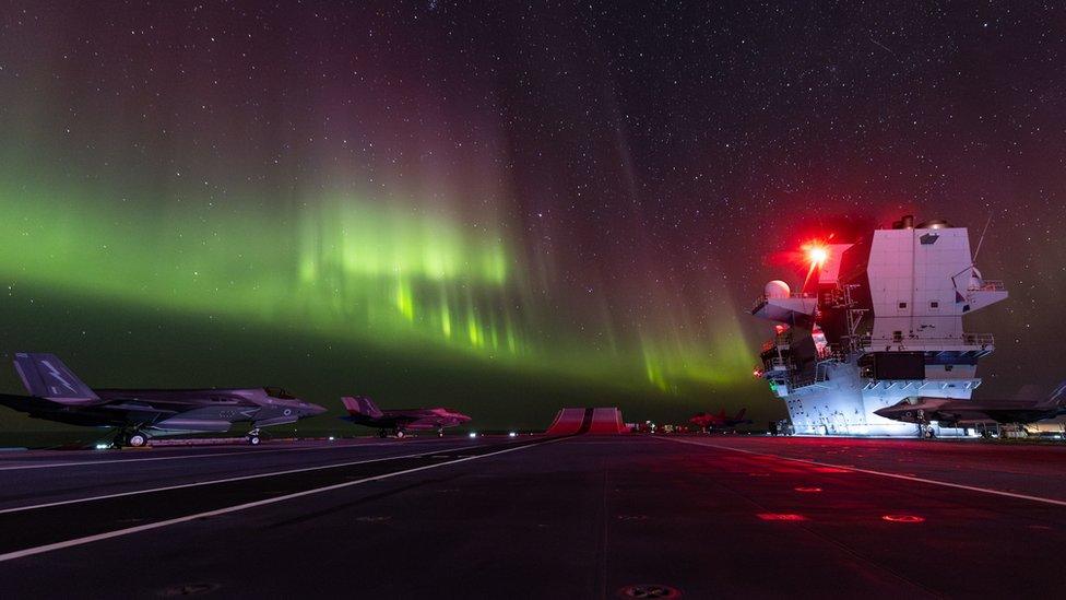 Carrier under northern lights