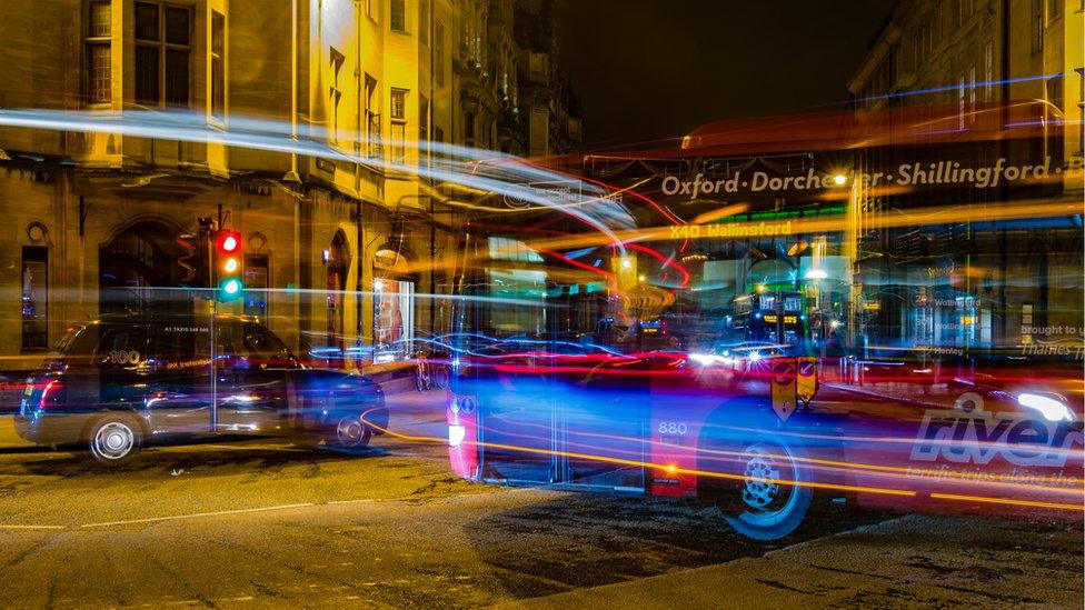 Busy traffic captured at Carfax in central Oxford