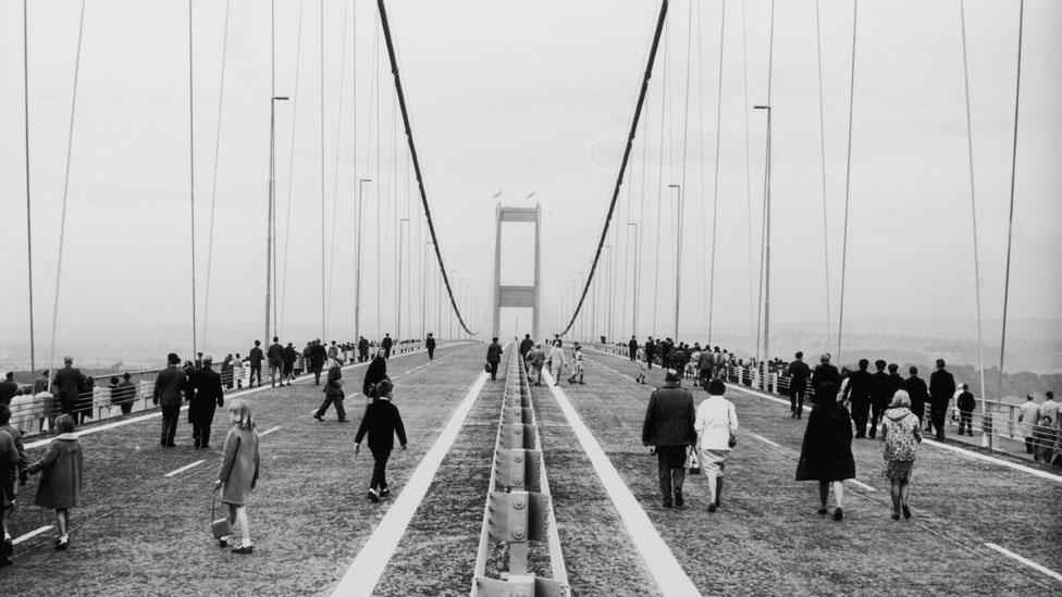 People walking across the Severn Bridge - shortly before it opened to vehicles in September 1966