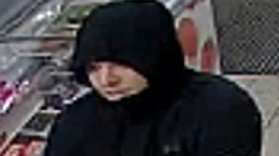 Image of a robbery suspect