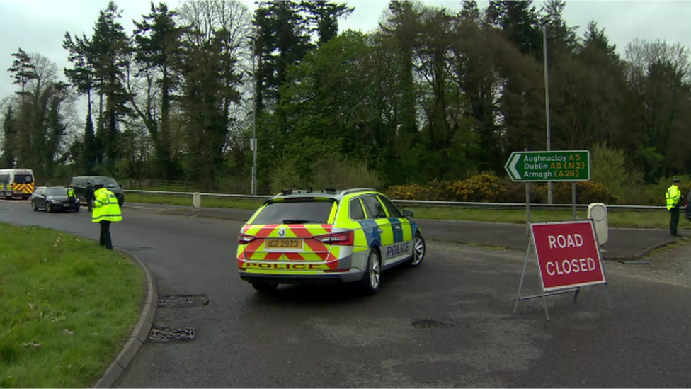 Police vehicles at the scene of the crash on Tullyvar Road in Aughnacloy