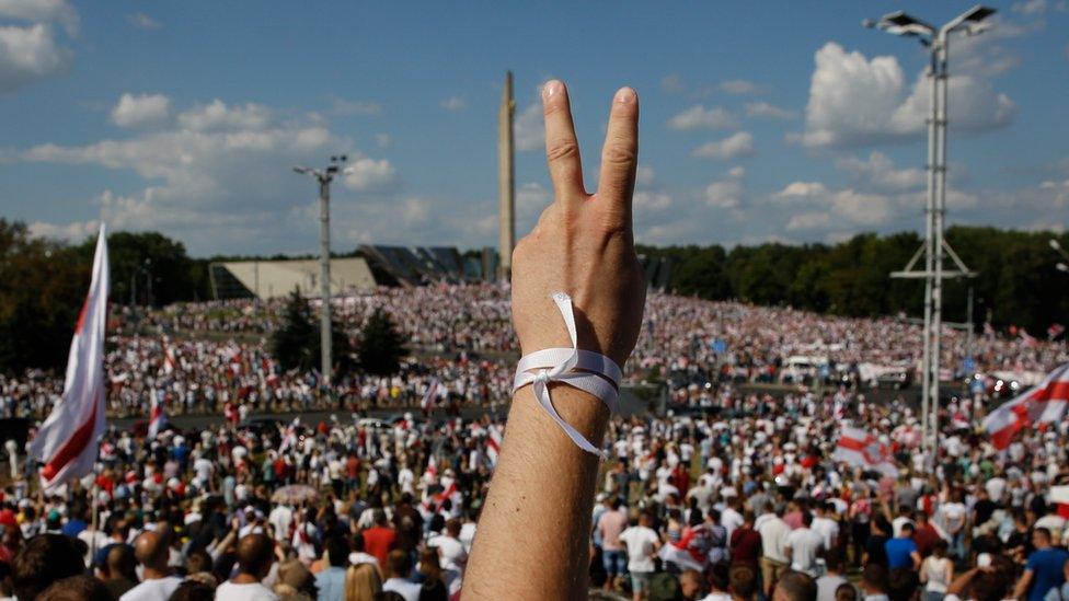 Thousands of people attend a rally in support of the Belarusian opposition