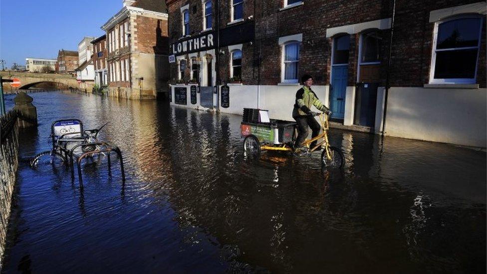 The River Ouse in York continues to rise flooding riverside properties in the City centre following heavy rainfalls across parts of the UK.