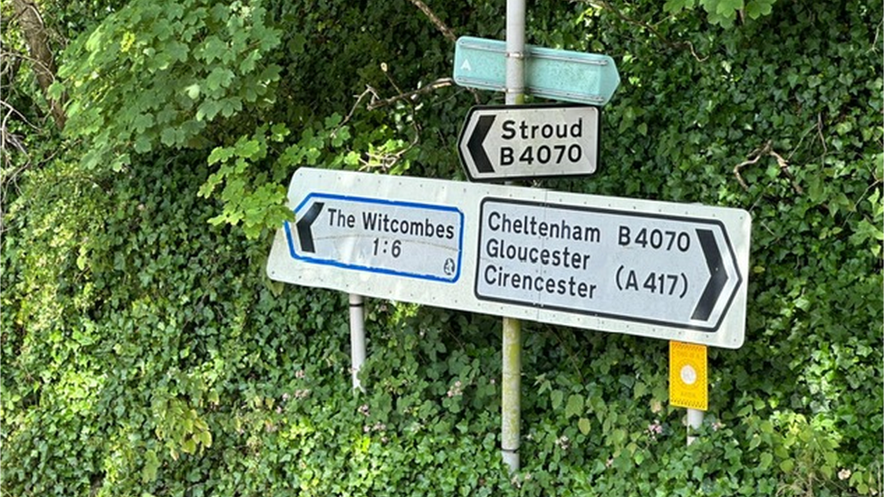 Road signs for Cheltenham and Stroud