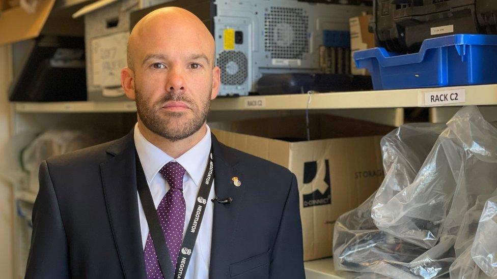 Det Insp Ant Preston in the Hardware evidence store