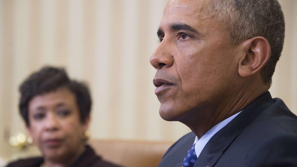 US President Barack Obama speaks with Attorney General Loretta Lynch in the Oval Office of the White House in Washington, DC, January 4, 2016