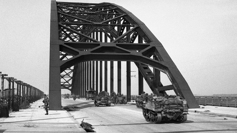 Carriers and lorries crossing the bridge at Nijmegen, 21 September 1944