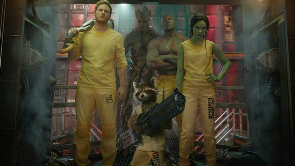 Chris Pratt, Dave Bautista and Zoe Saldana with Rocket Raccoon and Groot in the first Guardians film