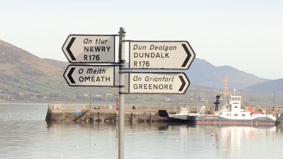 signposts pointing towards Newry and Dundalk