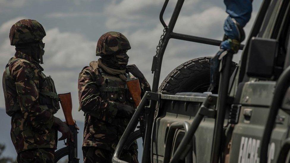 East African Regional Force (EACRF) soldiers guard Rumangabo camp after the meeting between EACRF officials and M23 rebels during the handover ceremony at Rumangabo camp in eastern Democratic Republic of Congo on January 6, 2023.