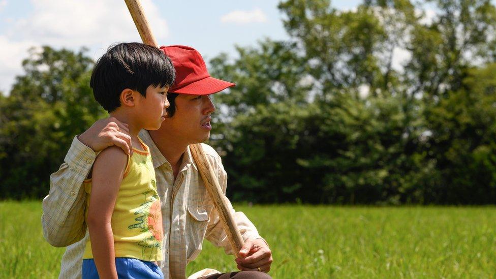 Alan S. Kim and Steven Yeun in Minari