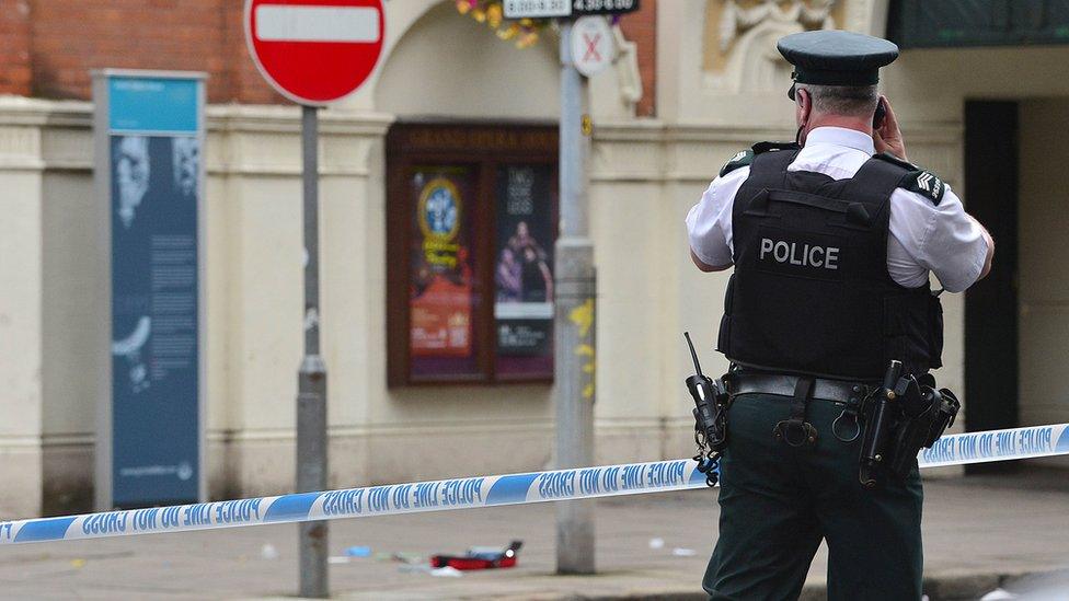 Police at the scene near the Grand Opera House in Belfast on Thursday