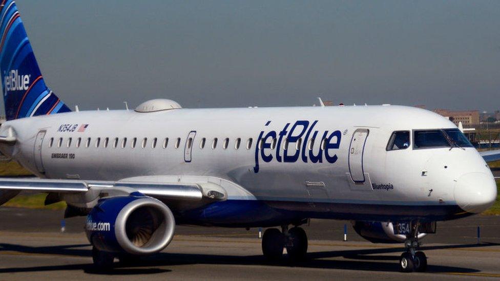 A JetBlue Embraer jet at New York's La Guardia airport