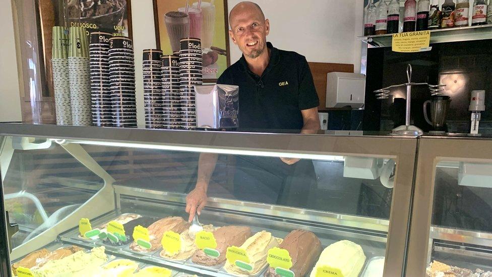 Ice-cream shop owner, Gianadrea Pipolo at his shop