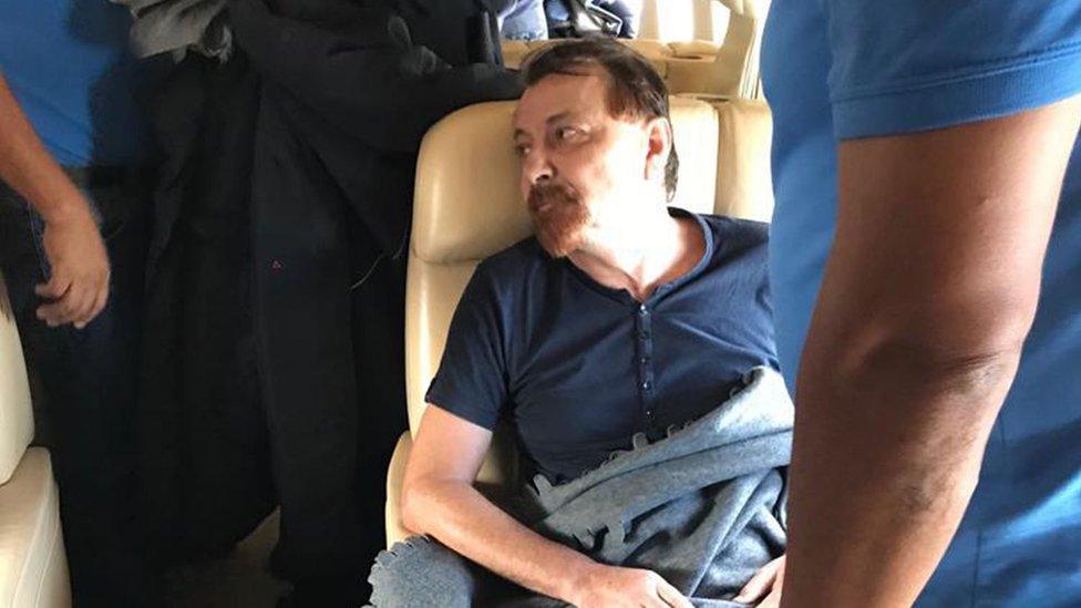 Italian Interior Ministry picture shows Cesare Battisti sitting on board a plane prior to taking off from Santa Cruz de la Sierra, Bolivia, on January 13, 2019