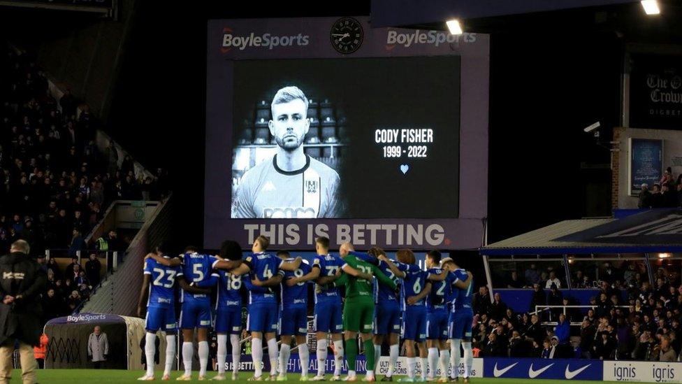 Players for Birmingham City and Hull hold a minute's silence for Cody Fisher at St Andrews