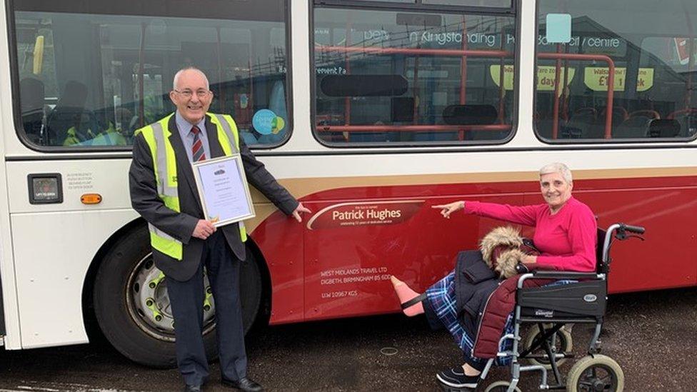 Pat Hughes and his wife Jan with his namesake bus