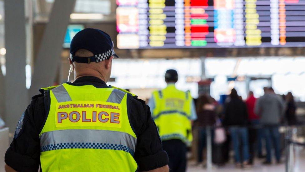 A police officer in an airport