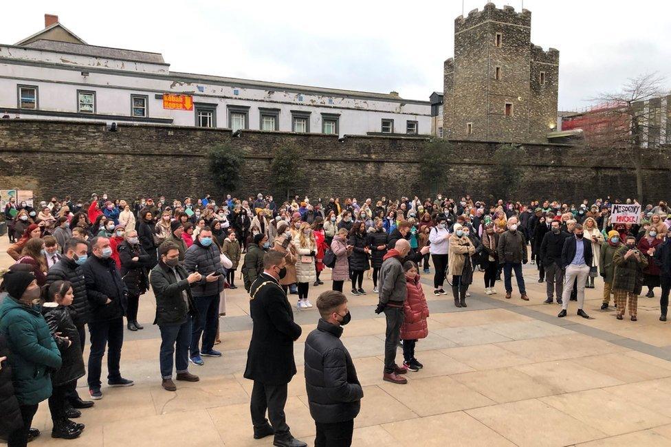 Politicians stood with members of the public in Derry's Guildhall Square