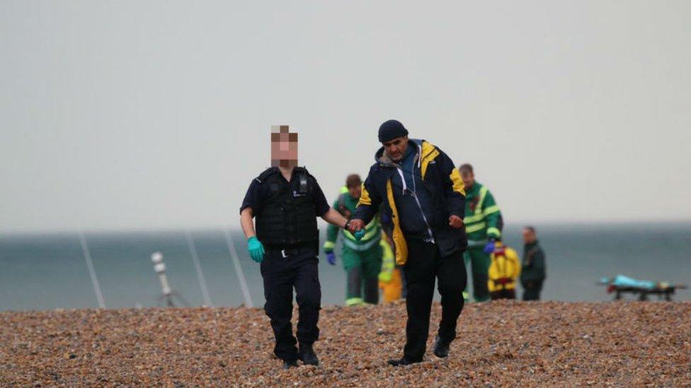 Migrants on beach