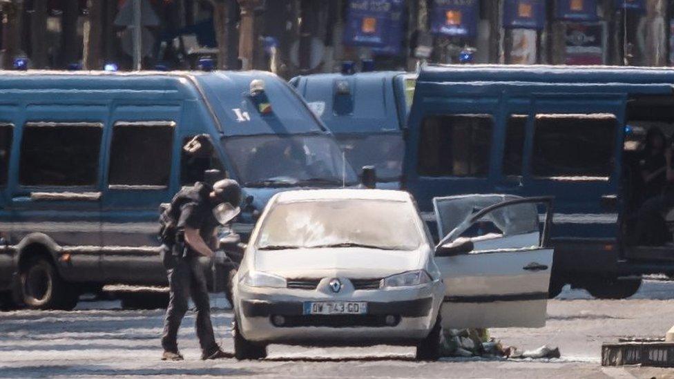 A police operation is under way on the Avenue des Champs-Élysées after a car collided a with a police vehicle in Paris, France, 19 June 2017.