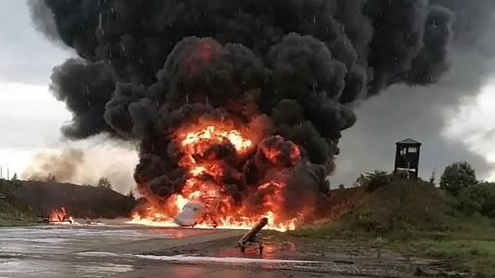 An image showing a Tu-22 on fire at Soltsy-2 airbase