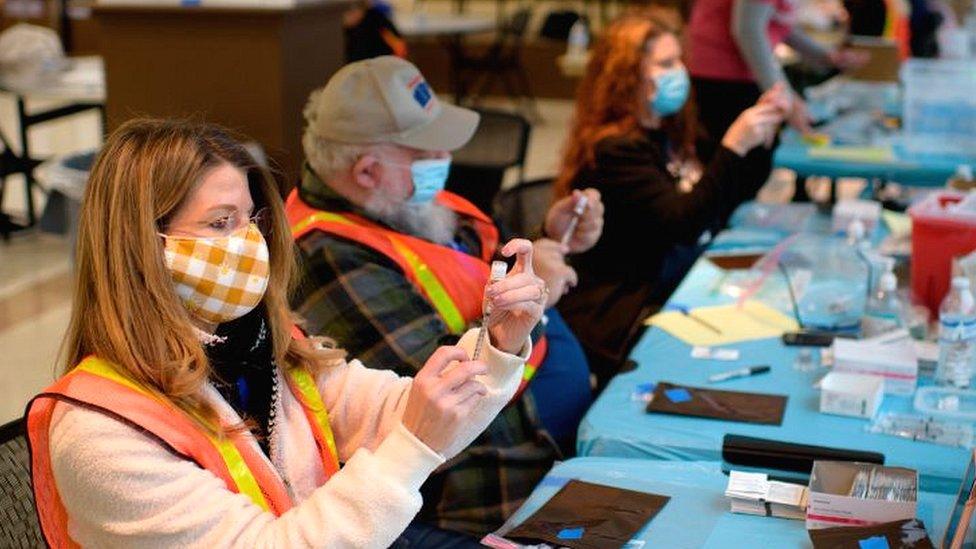 Vaccination centre workers in League City, Texas