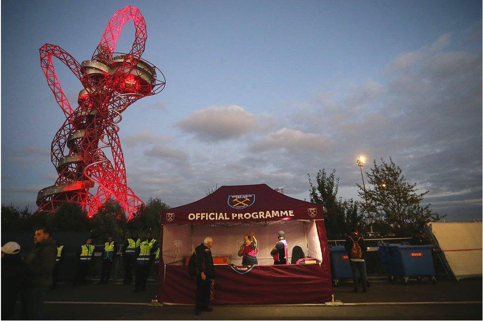 A West Ham United official programme stall in front of the ArcelorMittal Orbit at the Olympic stadium during the EFL Cup fourth round match between West Ham and Chelsea at The London Stadium on October 26, 2016 in London, England. (Photo by Catherine Ivill - AMA/Getty Images)