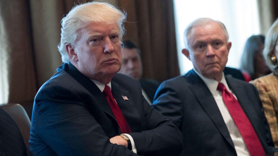 Donald Trump and Jeff Sessions sit in a White House meeting